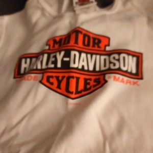 Harley shirt size large and black skinny size 7 black pants with holes